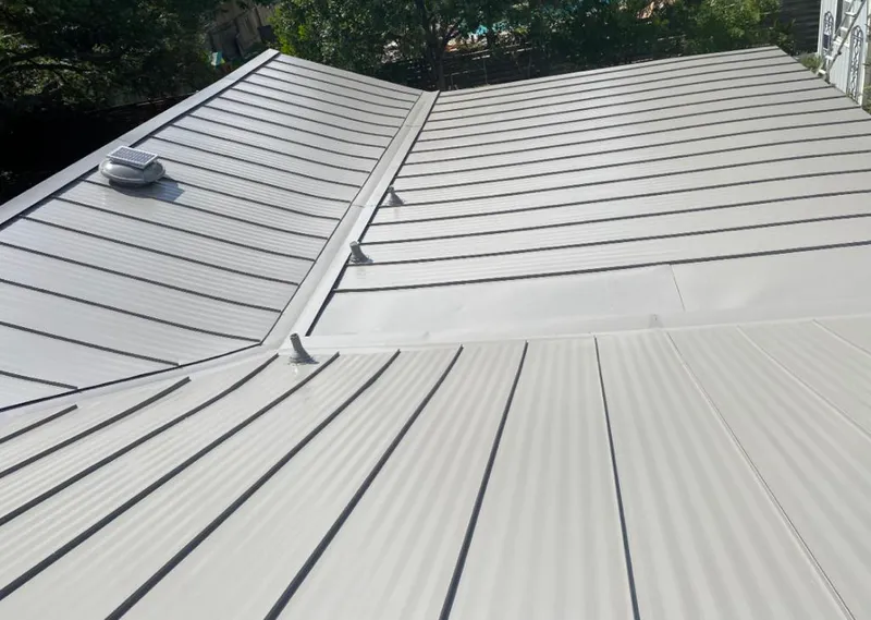 Solar attic fan installed on a metal roof for Roof Ventilation in Mission Viejo